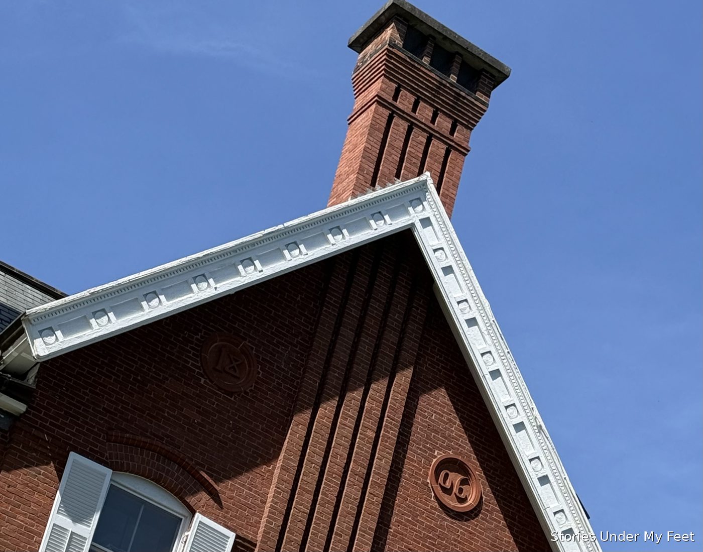 The mansion's brick gable, with an 1806 datestone set into the peak